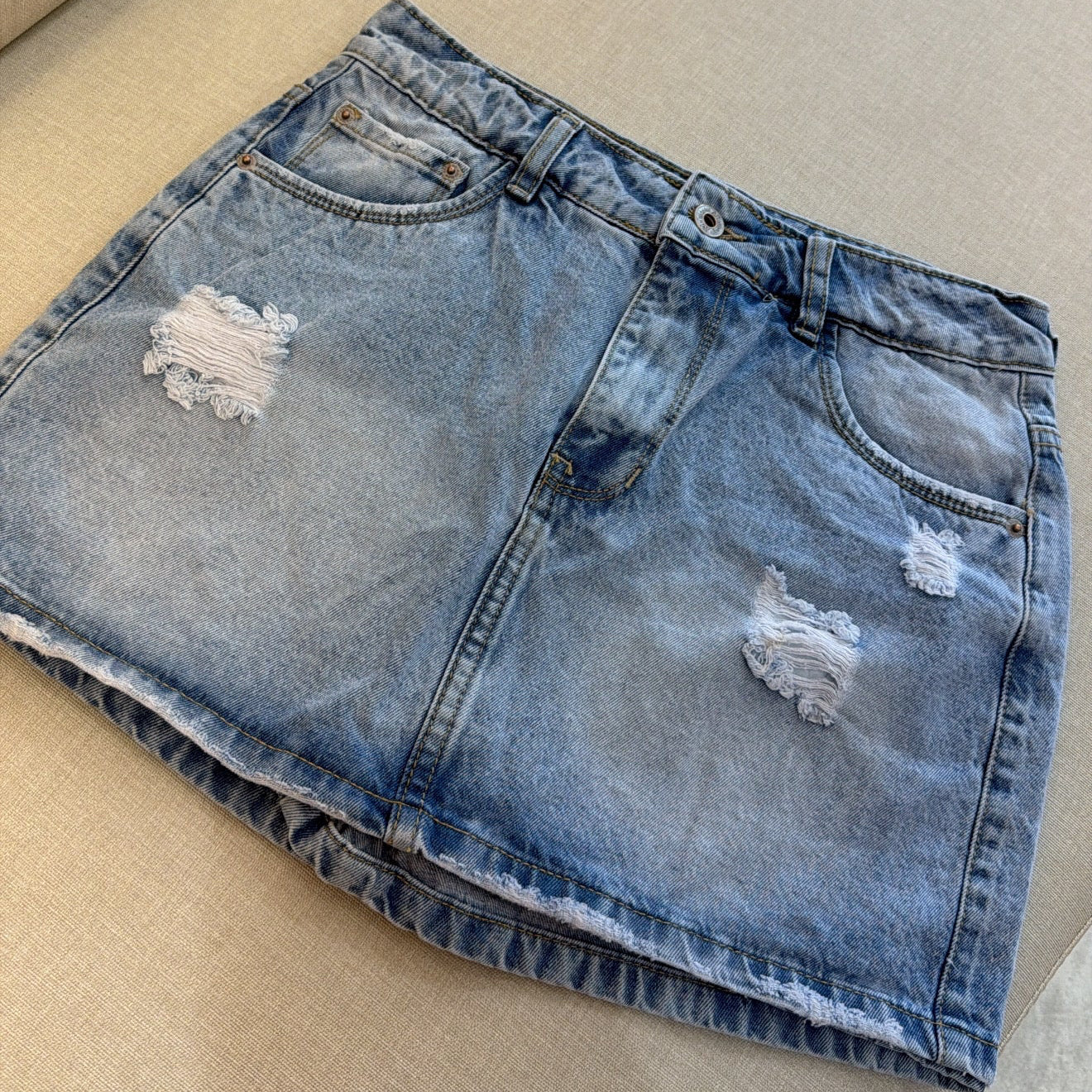 Falda short clara